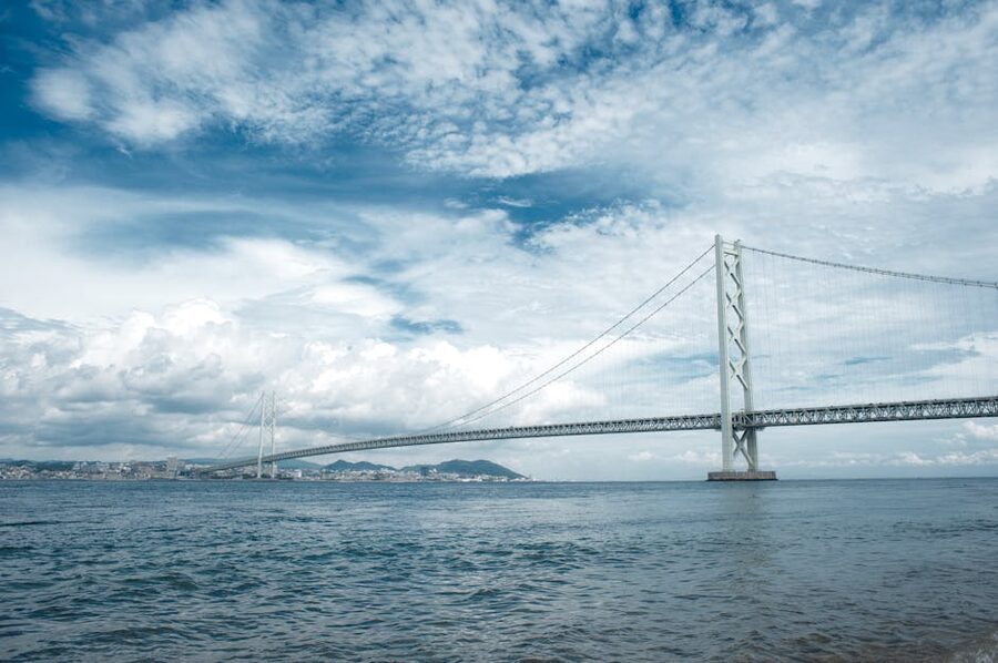 Akashi-Kaikyo Bridge from Awaji Island under blue sky
