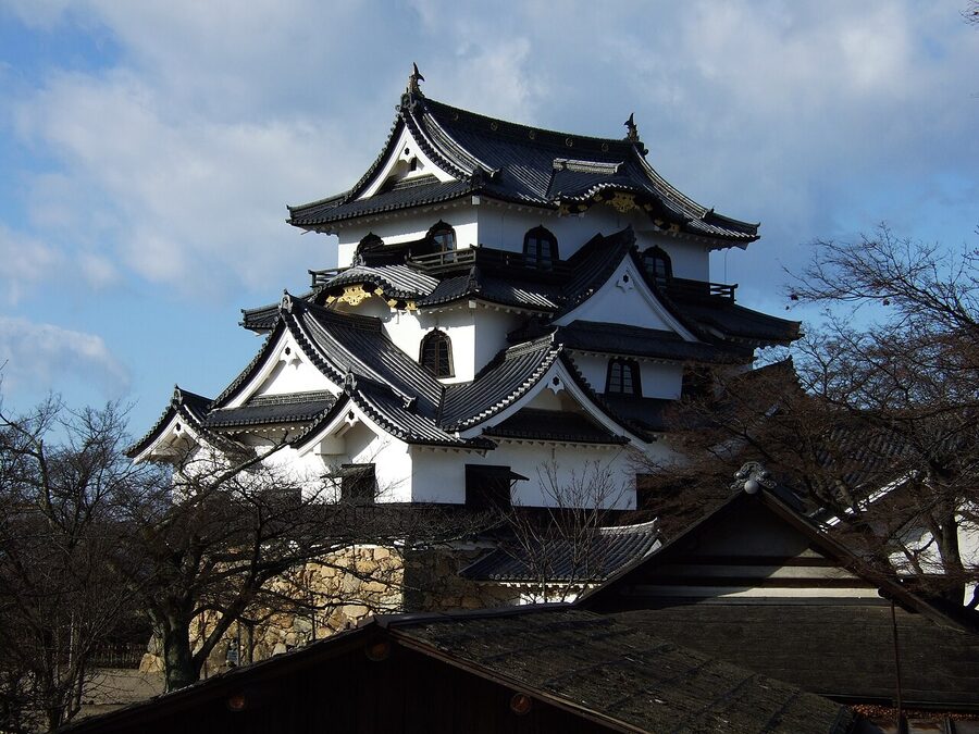 Hikone Castle keep against blue sky