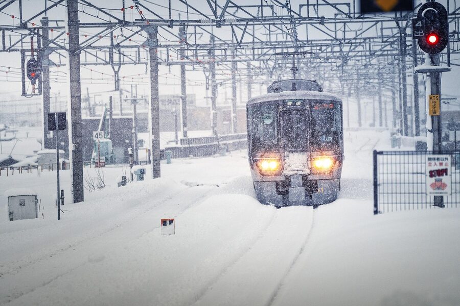 JR train in snowstorm on northern Lake Biwa