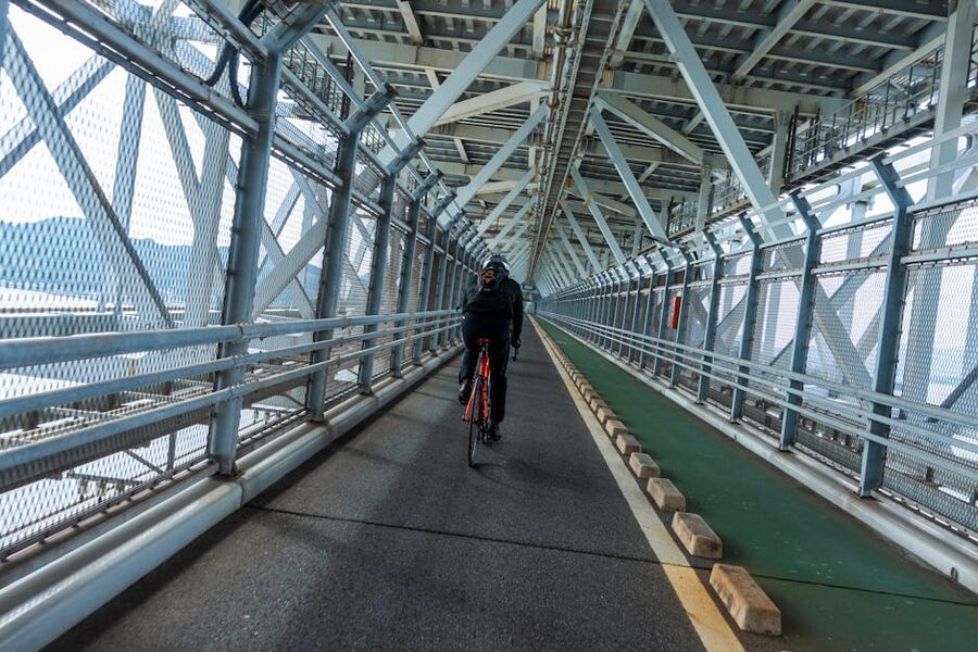 Cyclist on a bridge bike lane