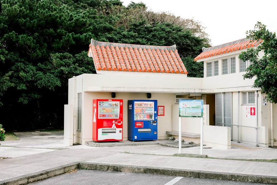 Roadside vending machines outside a traditional Japanese building