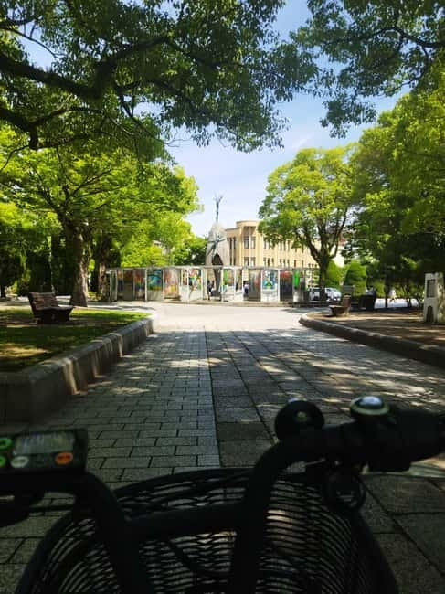 Hiroshima: Peace Park, Castle, and Mitaki Temple E-Bike Tour - Riding uphill to Mitaki Temple