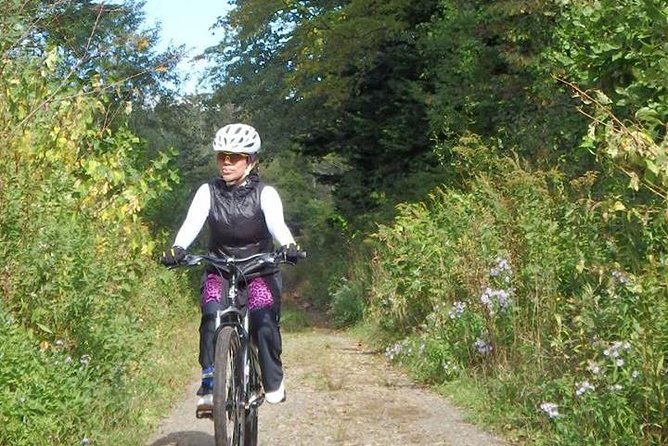 Nopporo Forest Mountain Bike Tour from Sapporo, presenting a retro Cycle cap - What the $52.55 price includes
