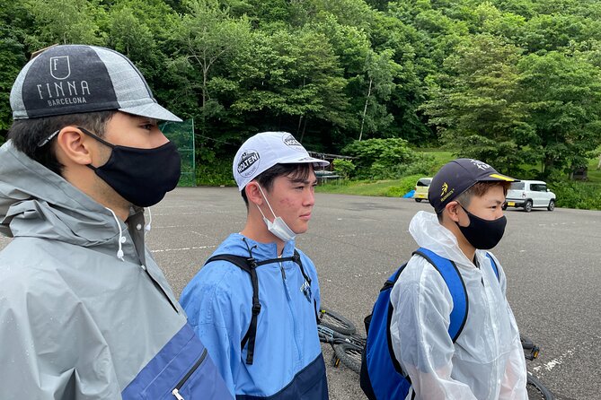 Nopporo Forest Mountain Bike Tour from Sapporo, presenting a retro Cycle cap - Getting fitted with the bike and helmet