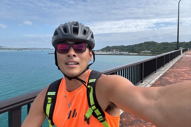 Okinawa 3 Hour Bike Tour with English Speaking Guide - Crossing Kaichu Road with water on both sides