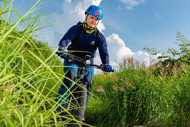 Private E-MTB guided cycling around Mt. Aso volcano & grasslands - The Kusa no Michi and the 800-meter ascent